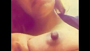 Big Tit Latina Milf sucking her nipple