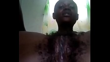 Naija ebony displays her hairy wet dripping pussy for your viewing pleasure