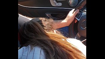 Girl gives head in a mercedes