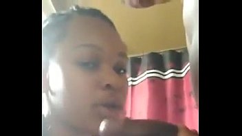 Black bitch gobbles her mans dick in the bathroom