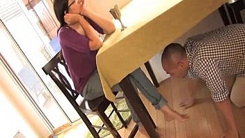 Foot worship under the table